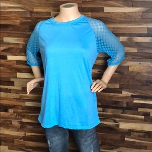 Woman’s Blue Blouse. New